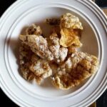 How to Make Crispy Fish Skin Chips: Easy, Crunchy & Delicious 9 Crispy fish skin chips on parchment